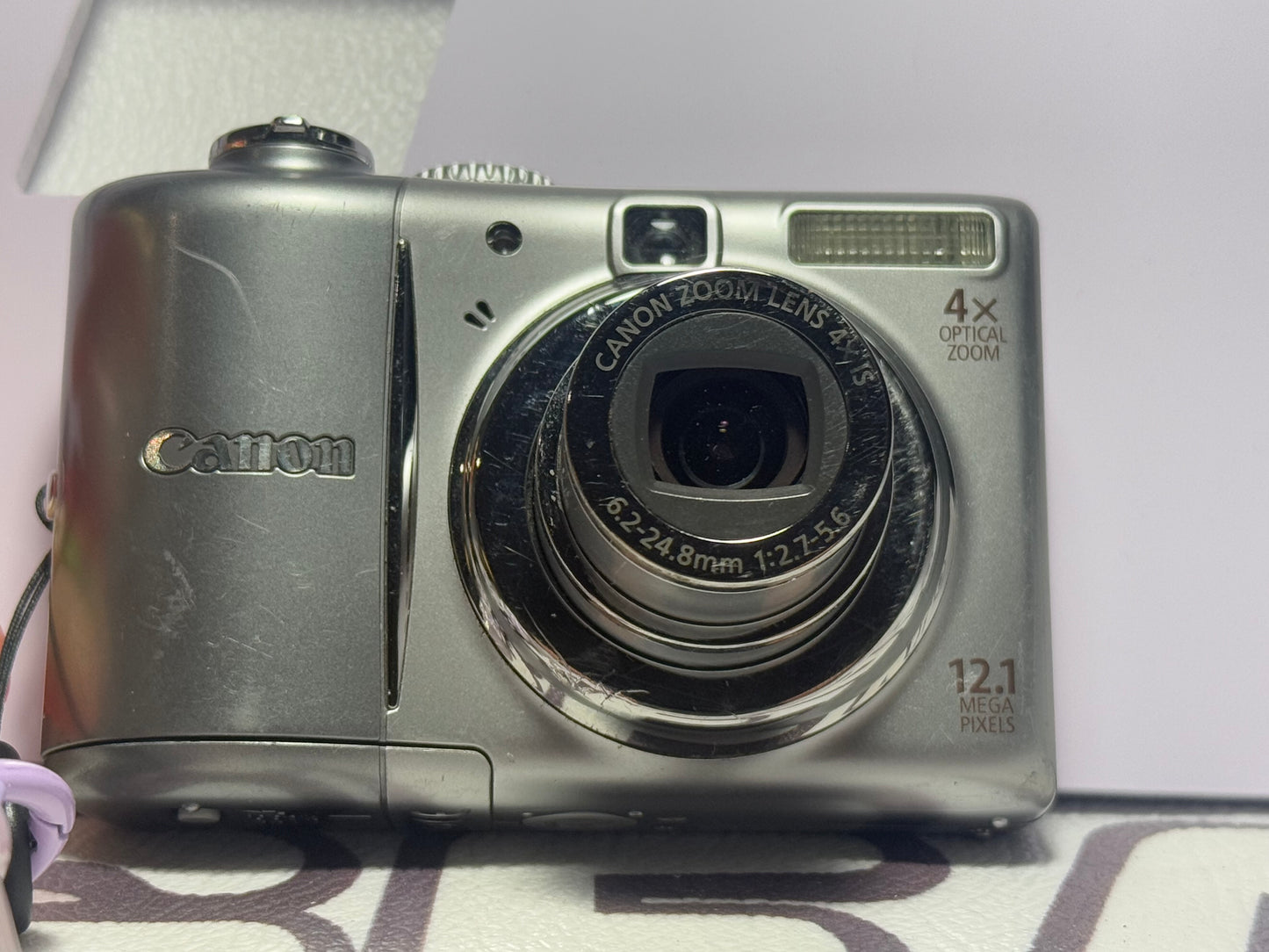 Canon PowerShot A1100 IS 12.1MP Digital Camera- Silver