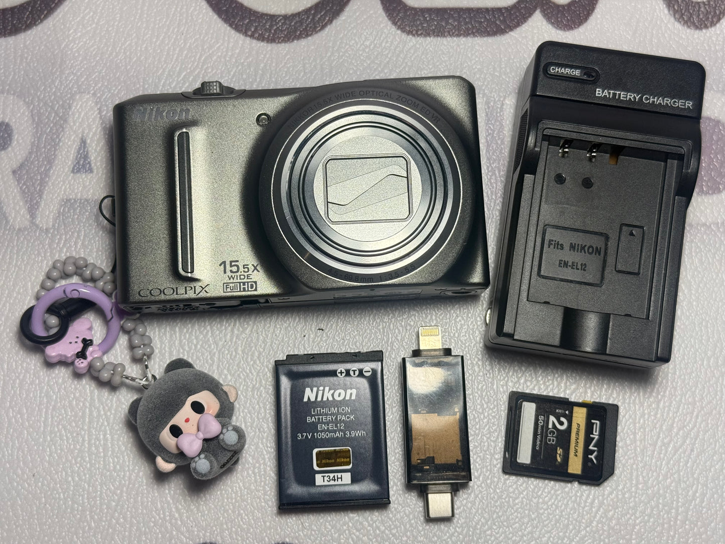 Nikon COOLPIX S9050 12.1 MP Digital Camera 15.5x Optical Zoom