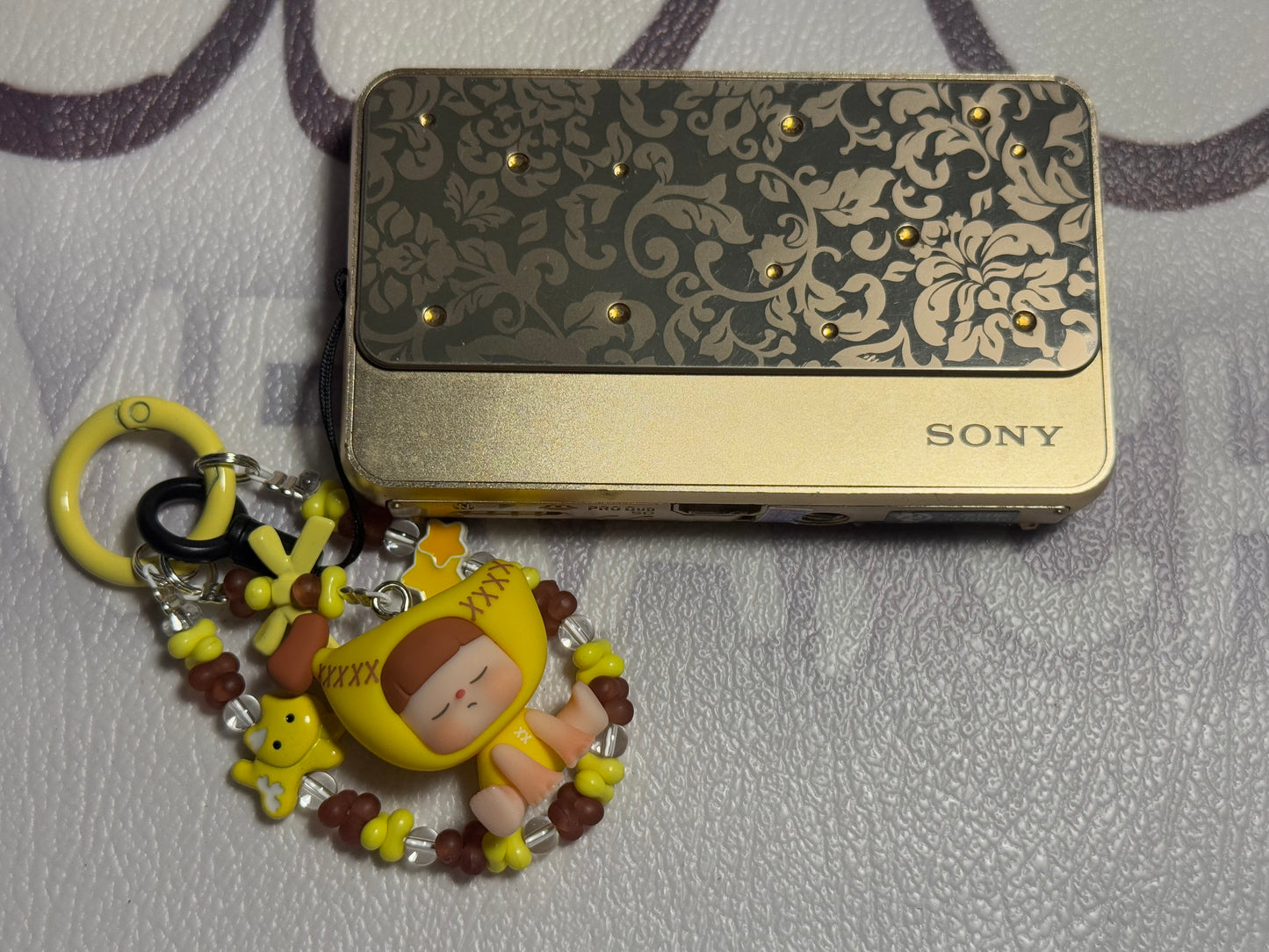 SONY Cyber Shot DSC-T99D 14.1MP 4x Compact Digital Camera (GOLD)