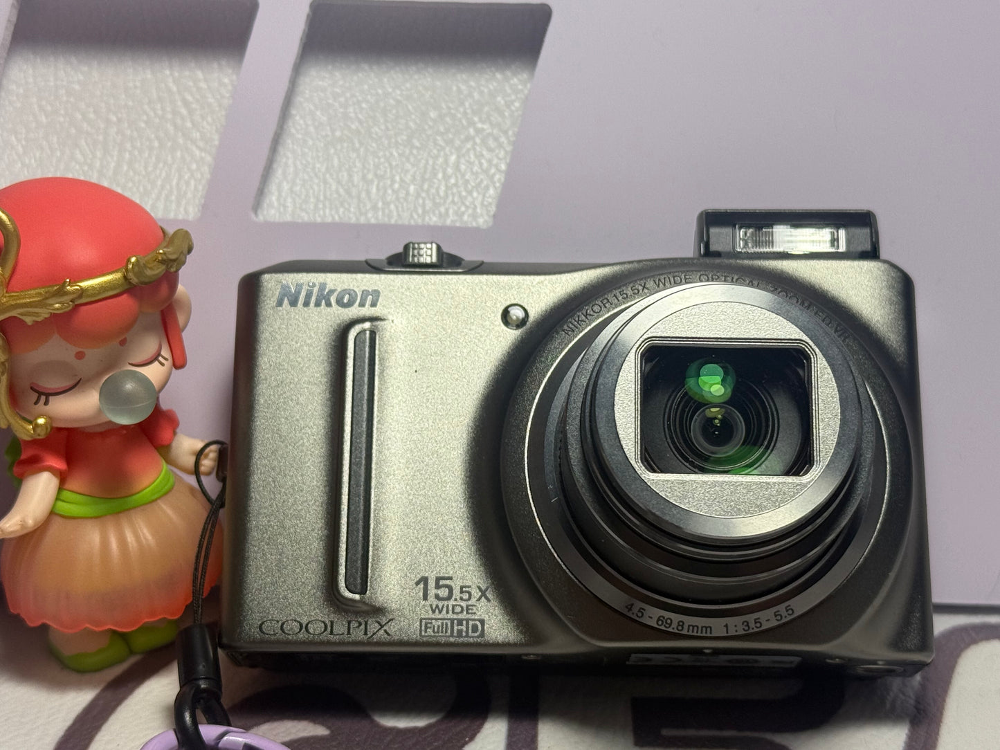 Nikon COOLPIX S9050 12.1 MP Digital Camera 15.5x Optical Zoom