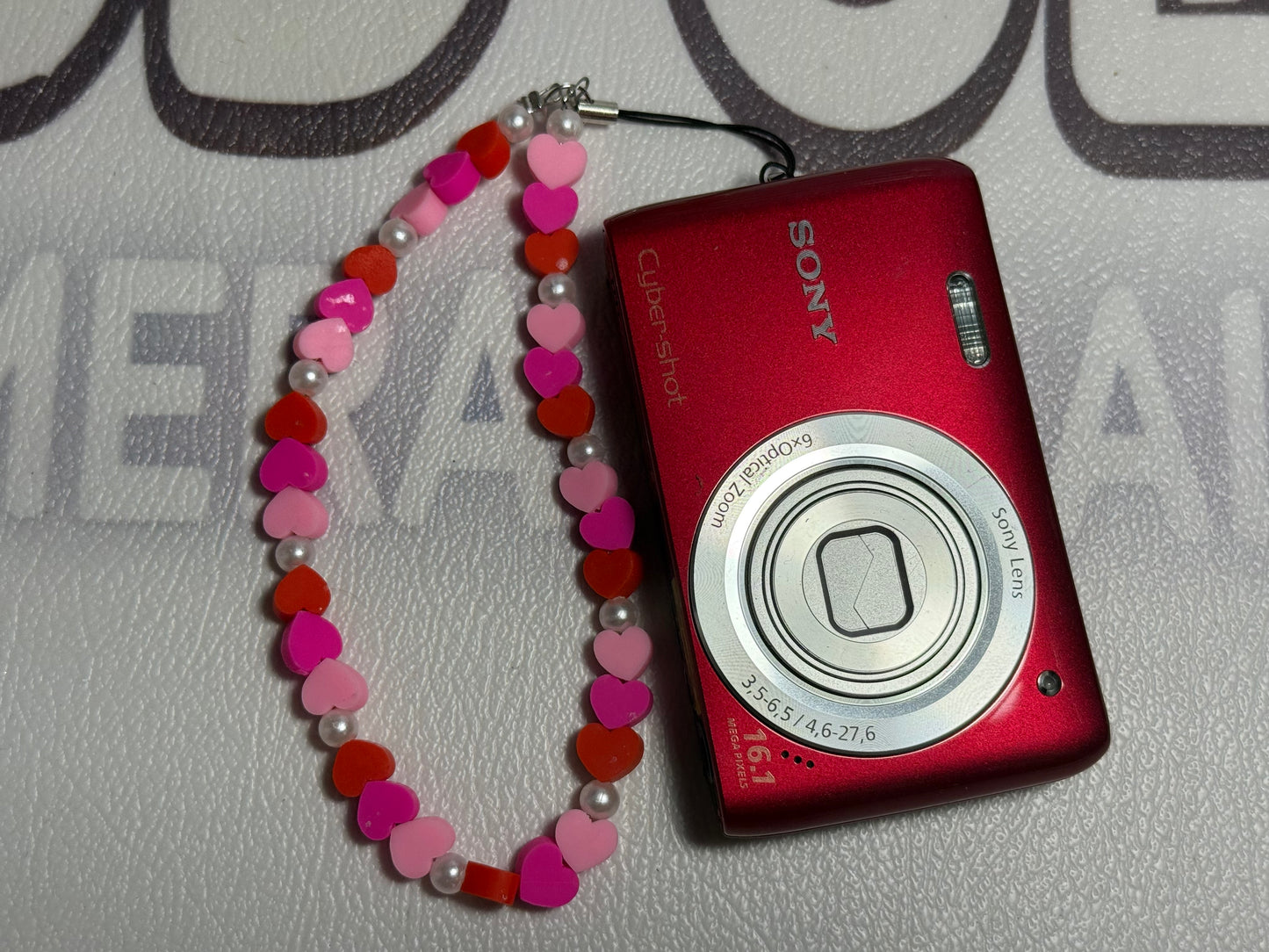 Sony Cyber Shot DSC-W670 16.1MP Digital Camera Built-in Flash - RED
