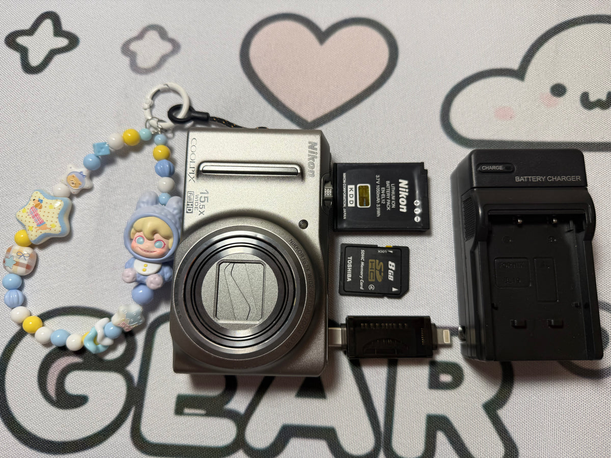 Nikon COOLPIX S9050 12.1 MP Digital Camera 15.5x Optical Zoom