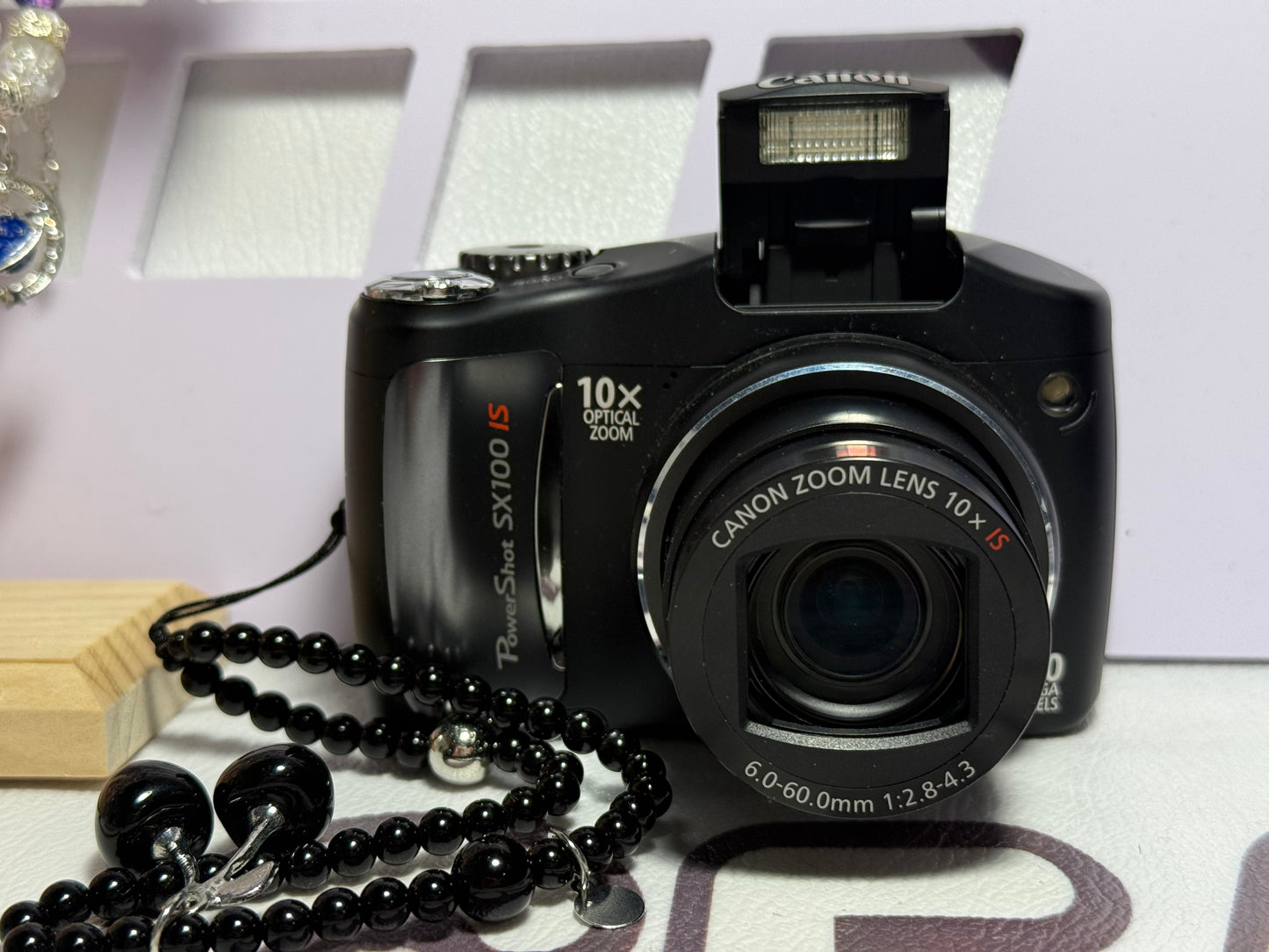 Canon PowerShot SX100 IS 8.0MP 10X Zoom Digital Camera
