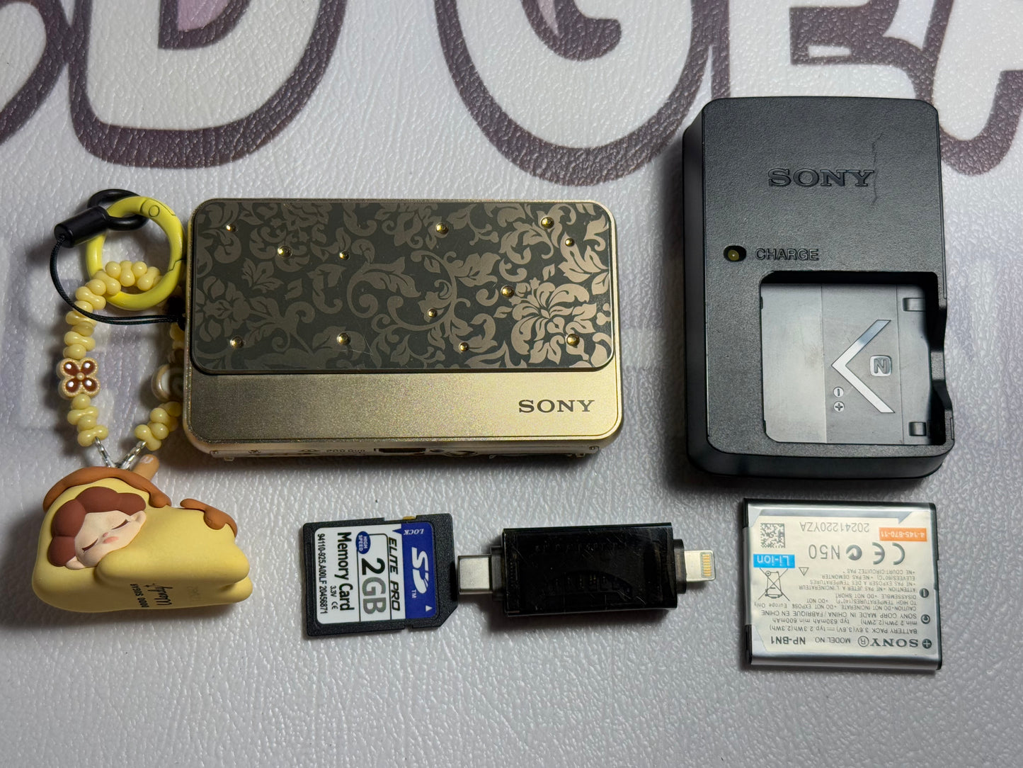 SONY Cyber Shot DSC-T99D 14.1MP 4x Compact Digital Camera (GOLD)